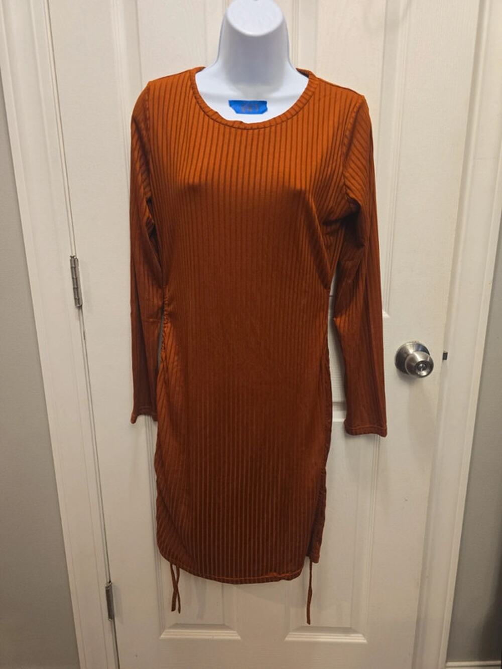 V27 xl Copper color long sleeve dress.  Adjustable sides